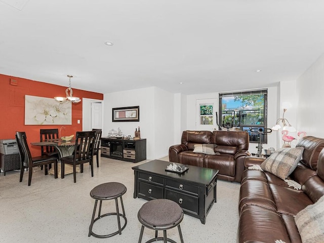 living room featuring a chandelier