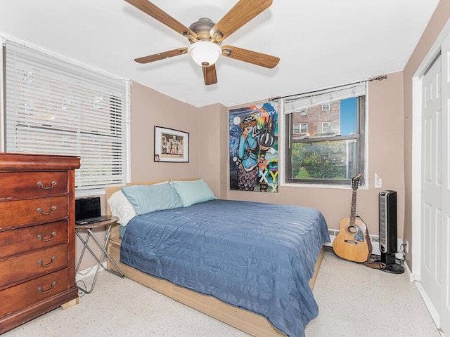 bedroom featuring a closet and ceiling fan