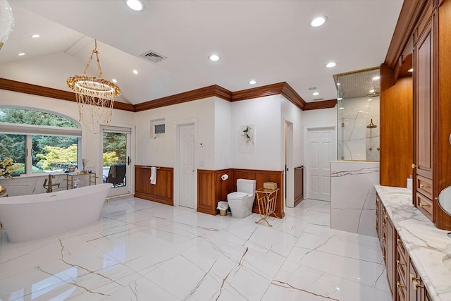 full bathroom featuring vanity, vaulted ceiling, ornamental molding, independent shower and bath, and a notable chandelier