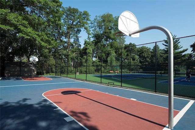 view of sport court with tennis court