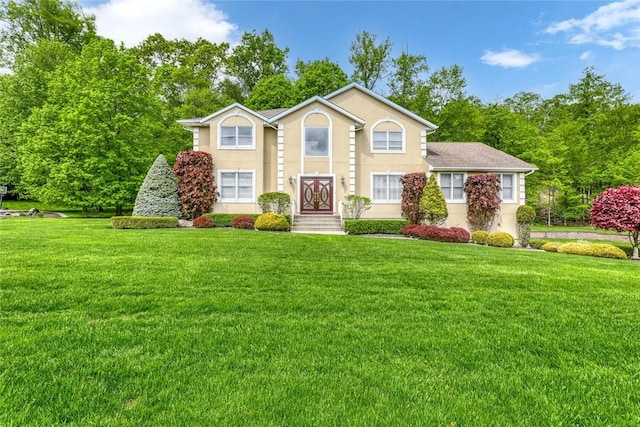 view of front of home featuring a front lawn