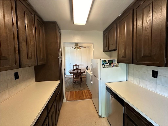 kitchen featuring dark brown cabinets, ceiling fan, and backsplash