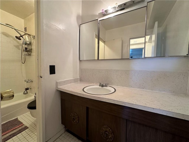 full bathroom featuring tile patterned flooring, vanity, toilet, and shower / bathtub combination