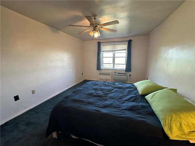 carpeted bedroom with ceiling fan, cooling unit, and radiator