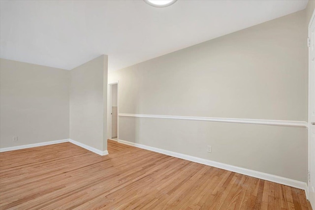 unfurnished room featuring light hardwood / wood-style flooring