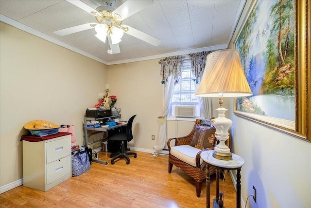 office area featuring light hardwood / wood-style flooring, cooling unit, and ornamental molding