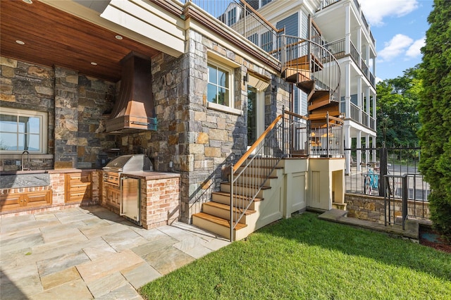 33 Livingston Ave, Dobbs Ferry, NY 10522 - doorway to property with stone siding, an outdoor kitchen, and a sink