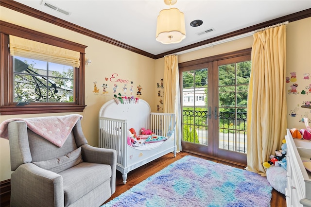 33 Livingston Ave, Dobbs Ferry, NY 10522 - bedroom with french doors, multiple windows, wood finished floors, and ornamental molding