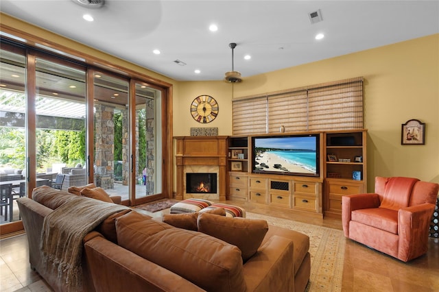 33 Livingston Ave, Dobbs Ferry, NY 10522 - living room with a premium fireplace, recessed lighting, and light tile patterned floors