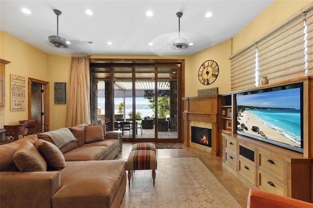 33 Livingston Ave, Dobbs Ferry, NY 10522 - living area featuring a ceiling fan, recessed lighting, a fireplace, and light tile patterned flooring