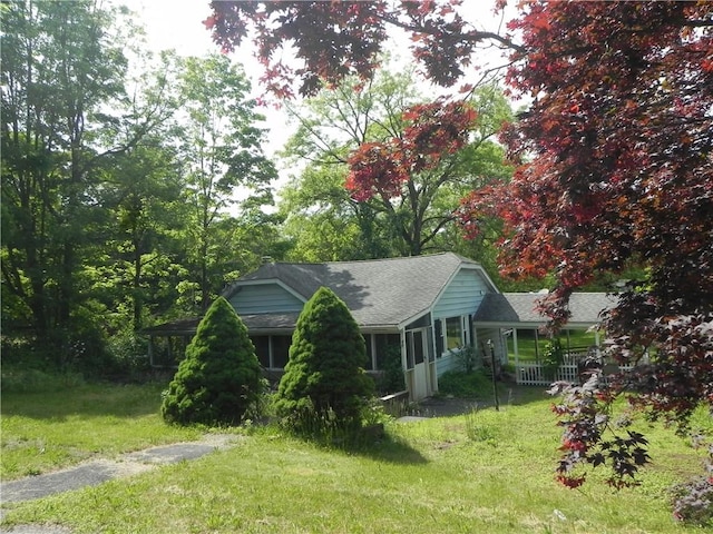 exterior space with a front lawn