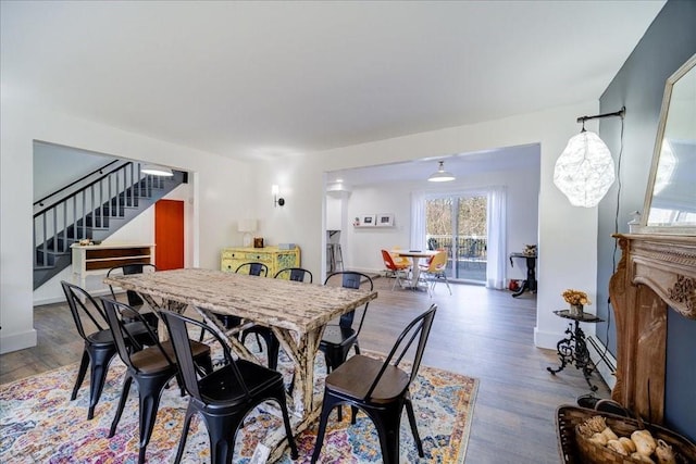 dining room with hardwood / wood-style flooring