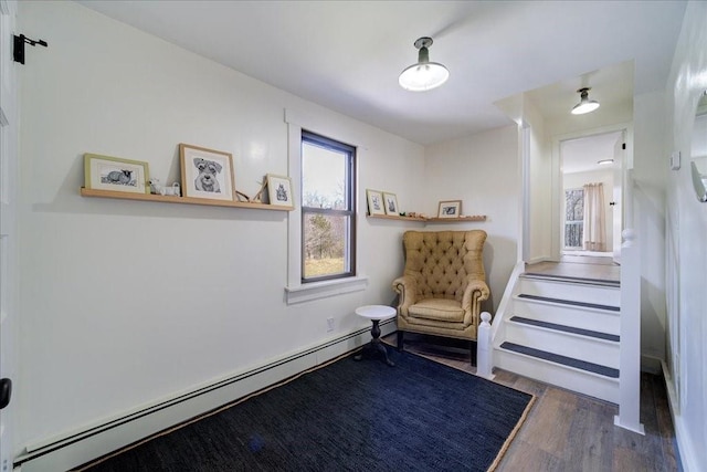 sitting room featuring dark hardwood / wood-style flooring and baseboard heating