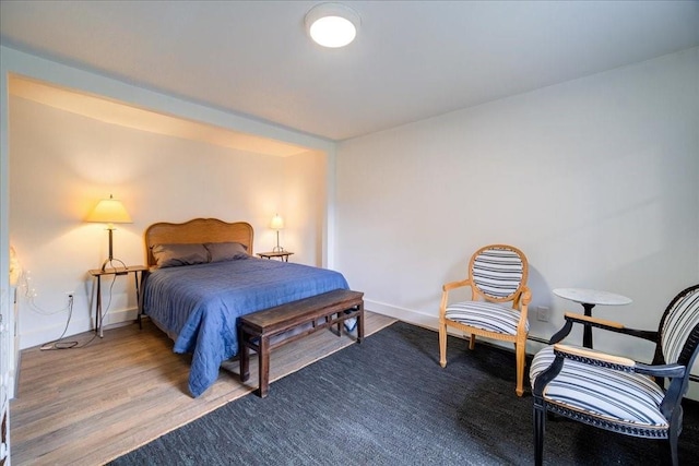 bedroom featuring hardwood / wood-style flooring