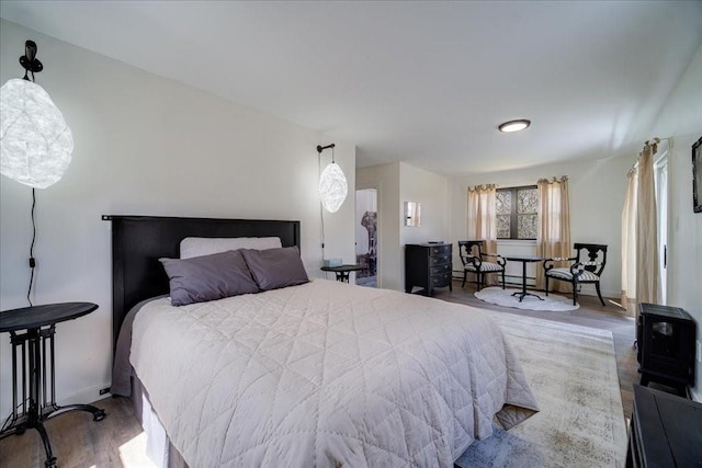 bedroom featuring hardwood / wood-style flooring