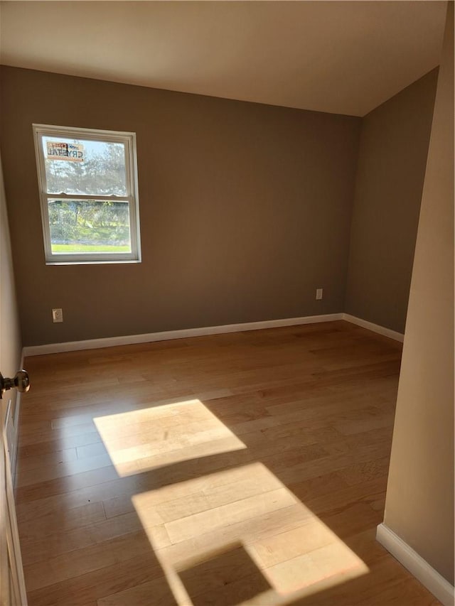 empty room featuring light hardwood / wood-style floors