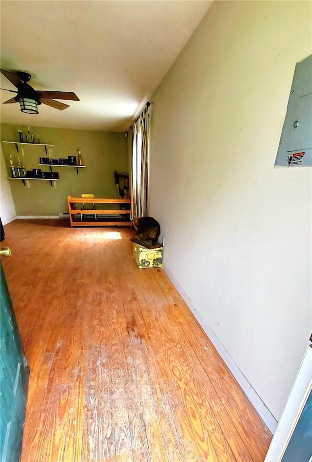 interior space featuring hardwood / wood-style floors and electric panel