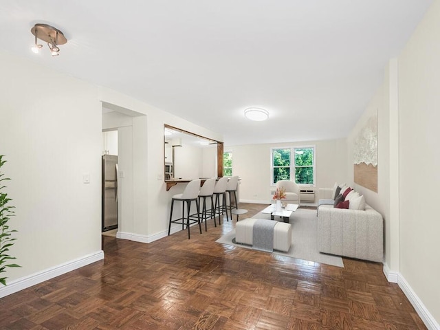 living room with dark parquet flooring