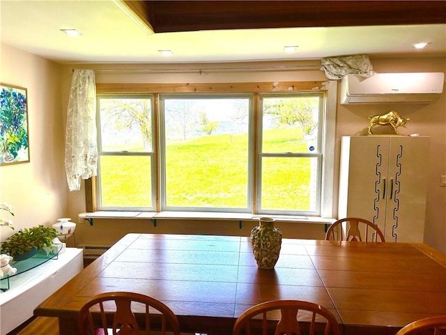 dining room featuring a wall unit AC and a baseboard heating unit