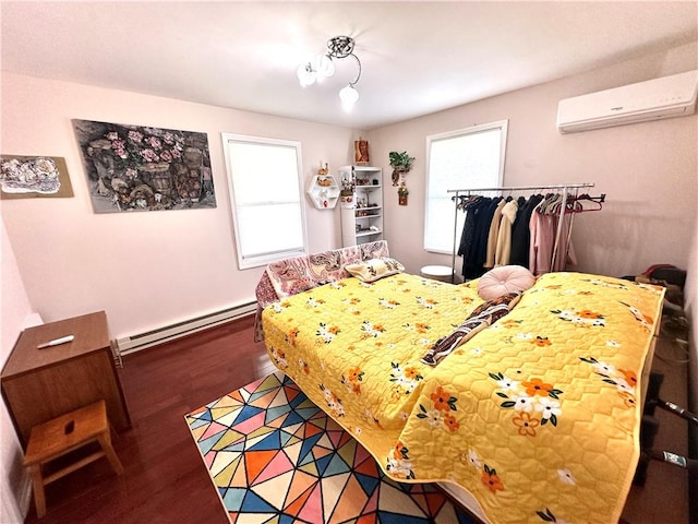 bedroom featuring a wall mounted air conditioner, dark wood-type flooring, and a baseboard radiator