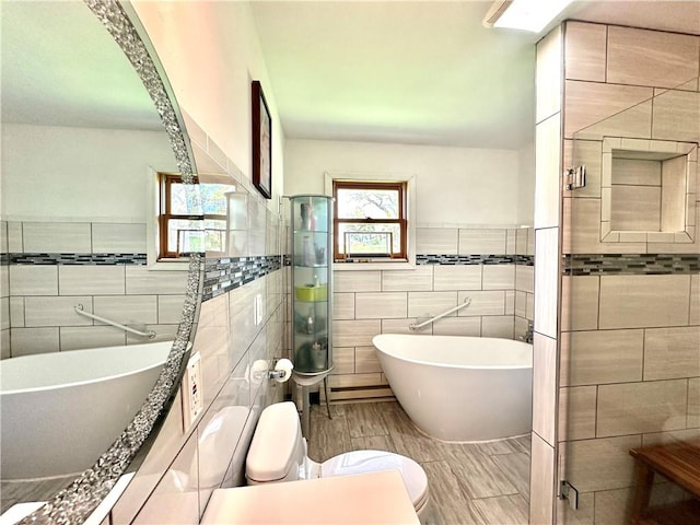 bathroom with separate shower and tub, toilet, wood-type flooring, and tile walls