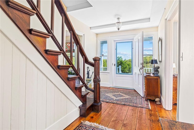 foyer entrance featuring hardwood / wood-style floors