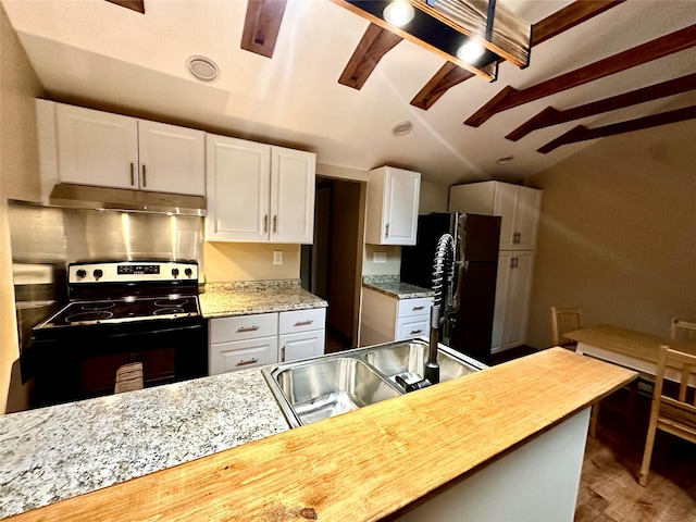 kitchen with vaulted ceiling with beams, sink, range with electric stovetop, black refrigerator, and white cabinets