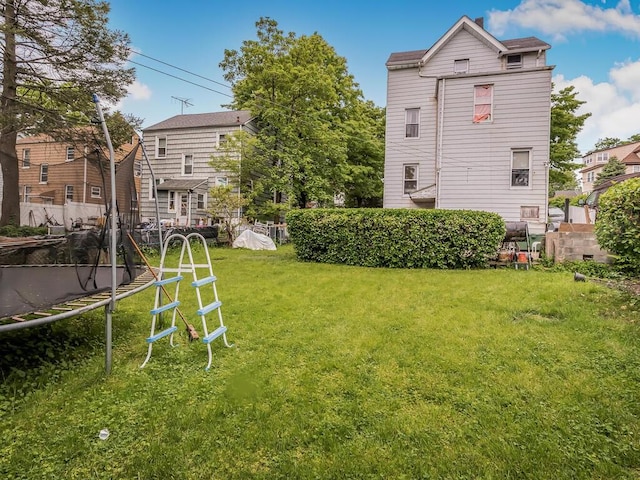 view of yard featuring a trampoline