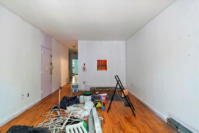 interior space with hardwood / wood-style flooring