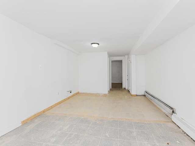 spare room featuring a baseboard radiator