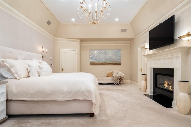 carpeted bedroom with ornamental molding and a chandelier