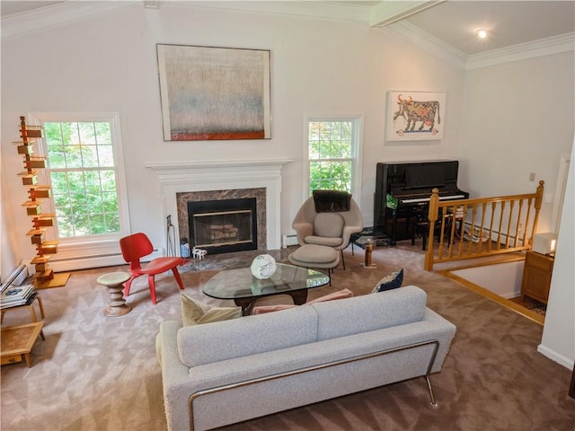 living room featuring vaulted ceiling with beams, carpet floors, ornamental molding, and a wealth of natural light