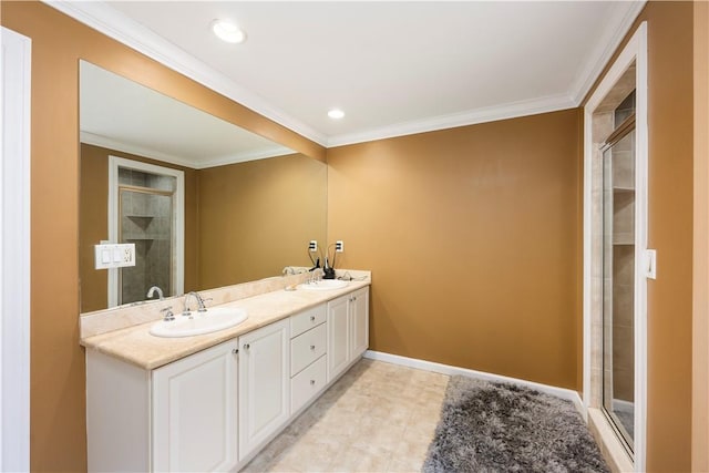 bathroom featuring tile patterned flooring, vanity, an enclosed shower, and ornamental molding