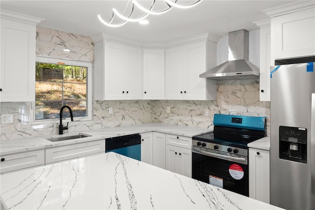 kitchen featuring white cabinetry, appliances with stainless steel finishes, sink, and wall chimney exhaust hood