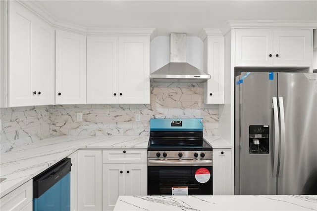 kitchen featuring white cabinetry, wall chimney range hood, light stone counters, and stainless steel appliances