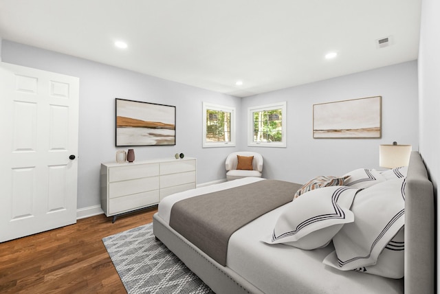 bedroom featuring dark hardwood / wood-style flooring