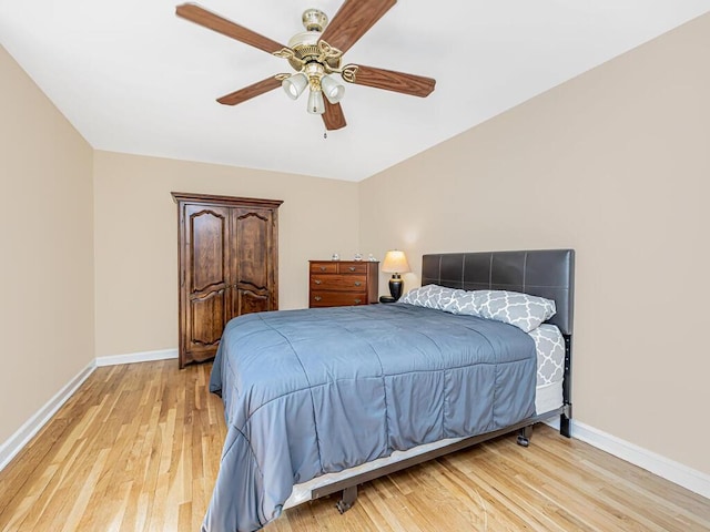 bedroom featuring ceiling fan and light wood-type flooring