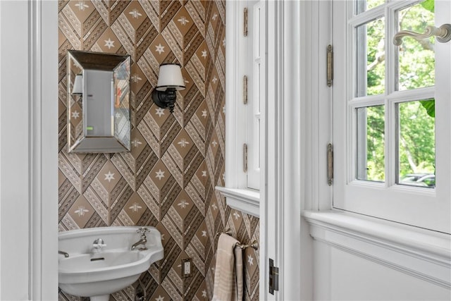 bathroom with plenty of natural light and sink