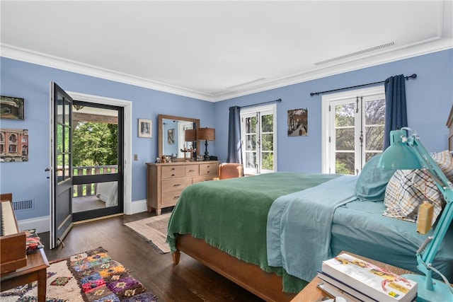 bedroom featuring access to outside, crown molding, and dark wood-type flooring