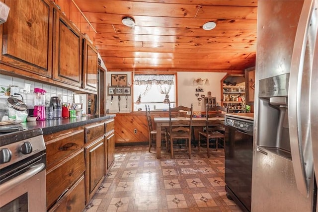 kitchen featuring appliances with stainless steel finishes and wooden ceiling