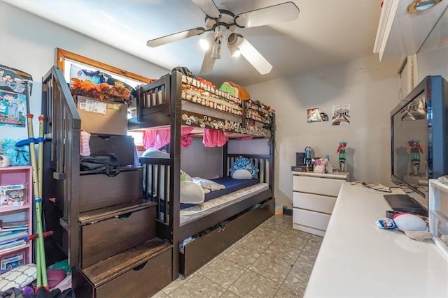 bedroom featuring light tile patterned floors and ceiling fan