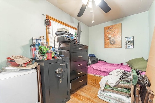 bedroom featuring ceiling fan and light hardwood / wood-style flooring