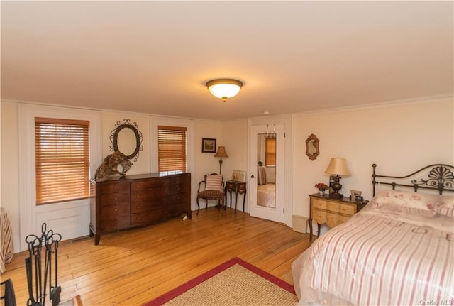 bedroom with light hardwood / wood-style flooring