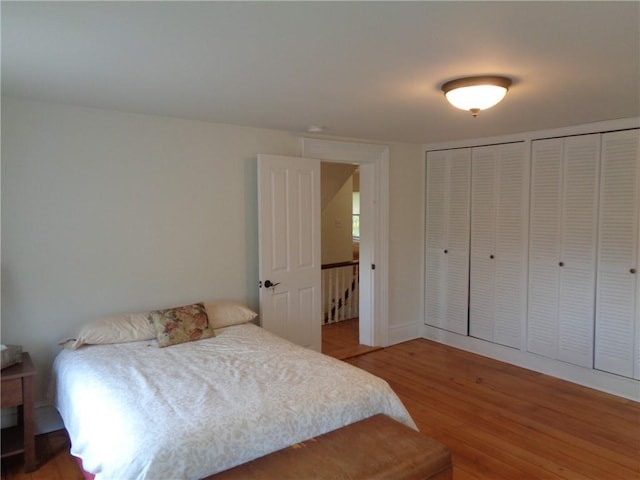 bedroom featuring wood-type flooring