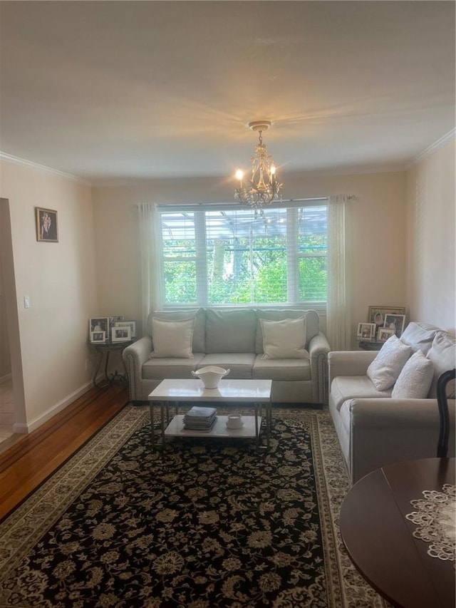 1357 Waring Ave, Bronx, NY 10469 - living room featuring plenty of natural light, ornamental molding, a chandelier, wood finished floors, and baseboards