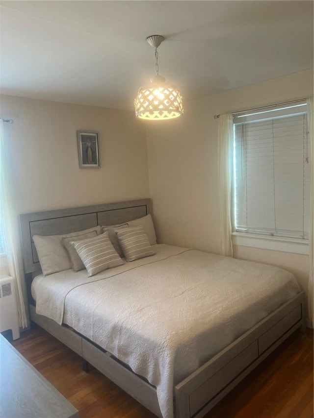 1357 Waring Ave, Bronx, NY 10469 - bedroom with wood finished floors and radiator