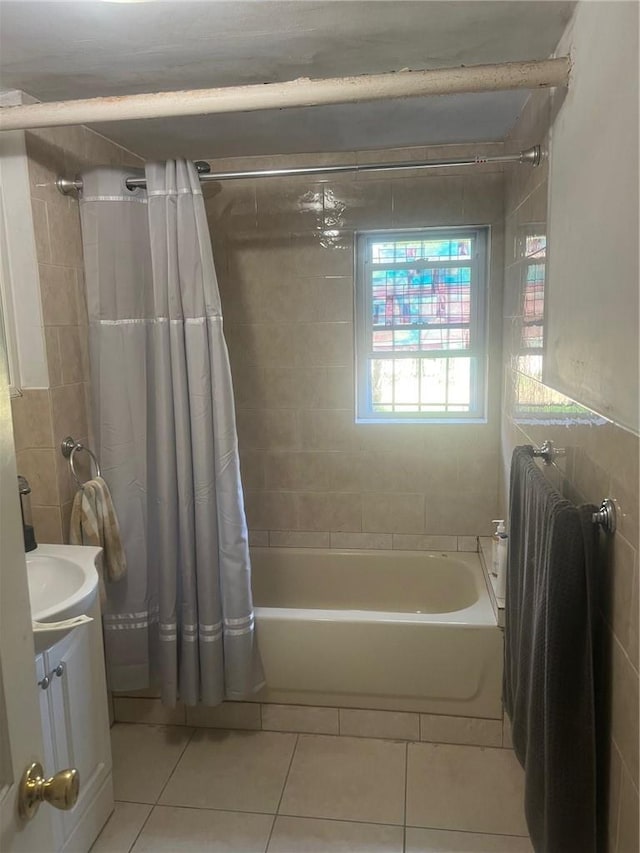 1357 Waring Ave, Bronx, NY 10469 - bathroom featuring tile patterned floors, shower / bathtub combination with curtain, vanity, and tile walls