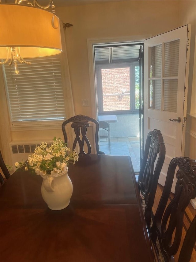 1357 Waring Ave, Bronx, NY 10469 - dining area with a chandelier and radiator heating unit