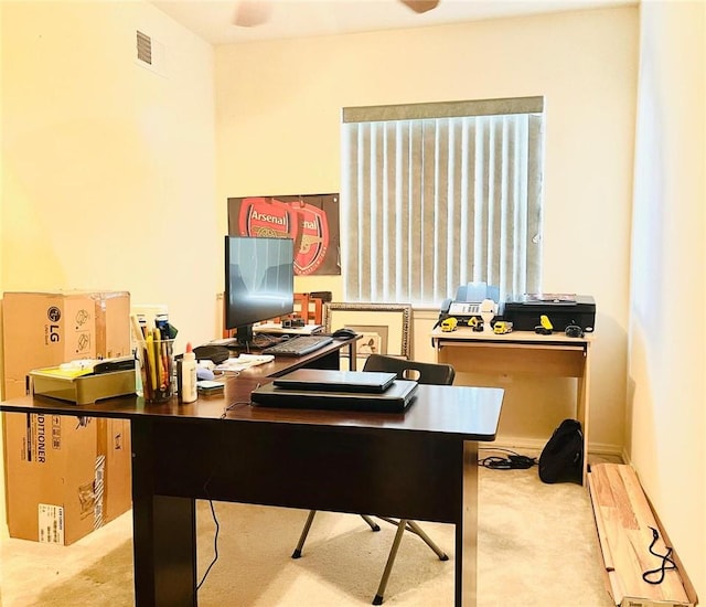 office area featuring light colored carpet