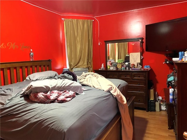 bedroom featuring light wood-type flooring